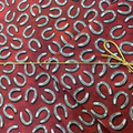 Benartex - Yellowstone - Tossed Horseshoes Brick Red Fabric